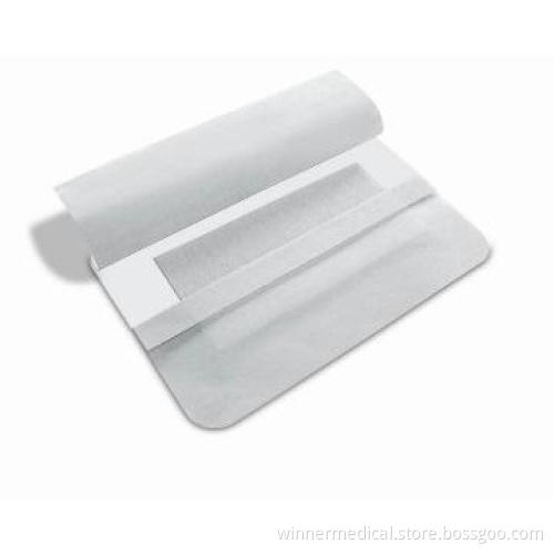Waterproof transparent film island wound dressing